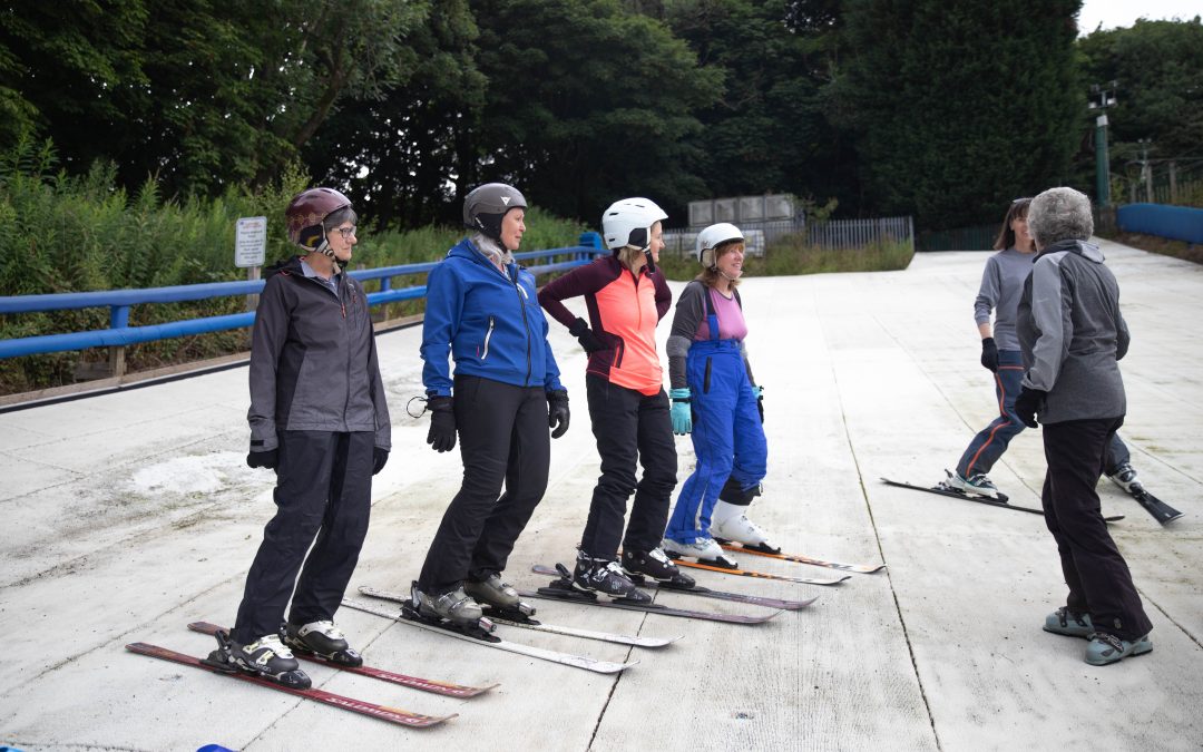 Ladies Morning Beginner Intake, group of female skiers on our intermediate slope